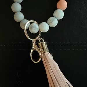 NWOT silicone key ring ring wristlet gray & peach​